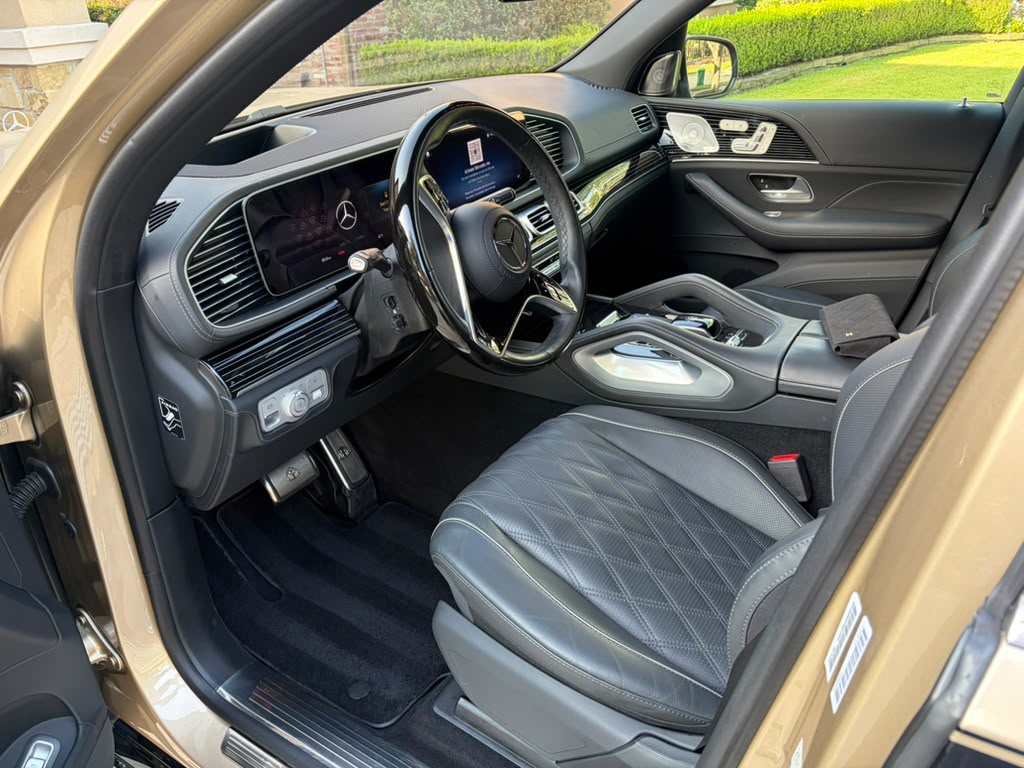 Foam wash on a black luxury SUV